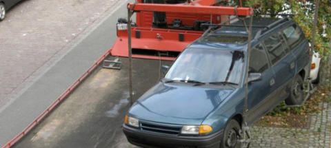 Green Vehicle Being Recovered